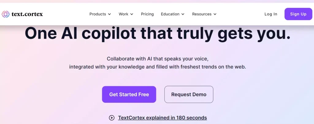 TextCortex homepage showcasing their AI writing software's interface with the tagline "One AI copilot that truly gets you" and options to get started for free or request a demo.